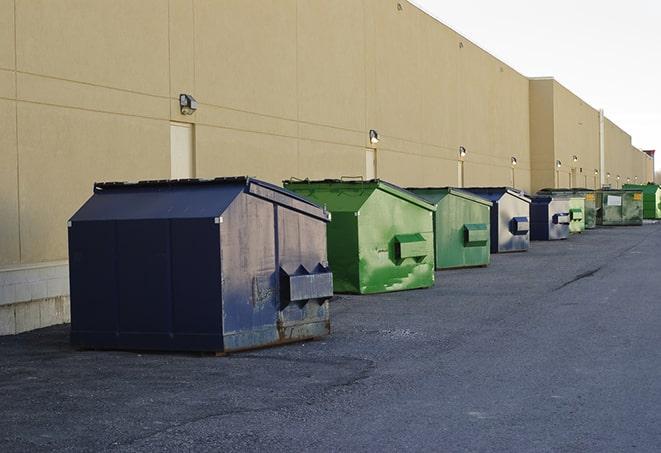 construction dumpsters stacked in a row on a job site in Fullerton